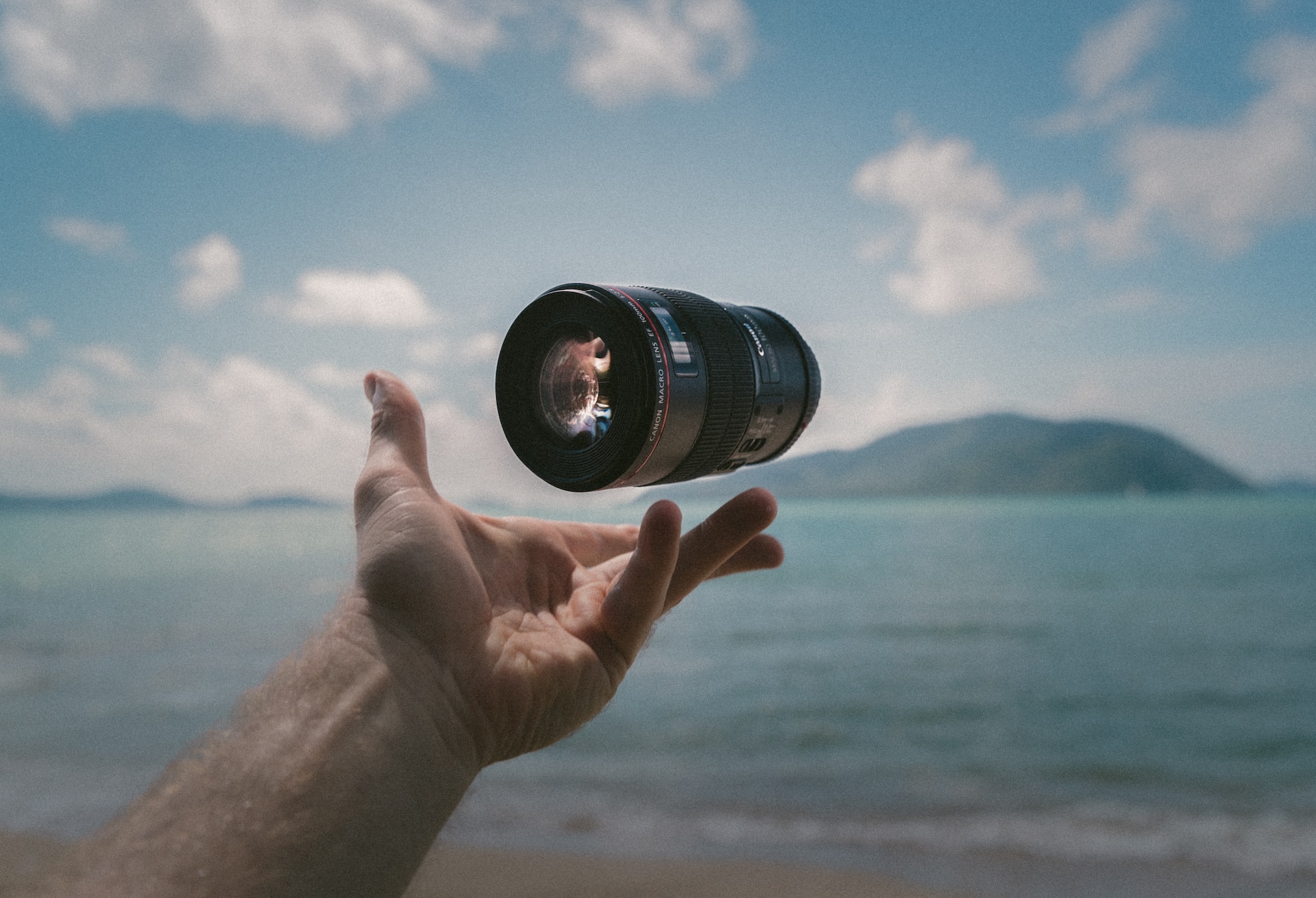 Lens floating over a hand. Photo by Jakob Owens from Unsplash.com